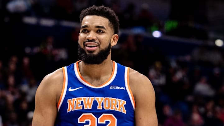 Dec 21, 2024; New Orleans, Louisiana, USA;  New York Knicks center Karl-Anthony Towns (32) reacts after a play against the New Orleans Pelicans during the first half at Smoothie King Center. Mandatory Credit: Stephen Lew-Imagn Images