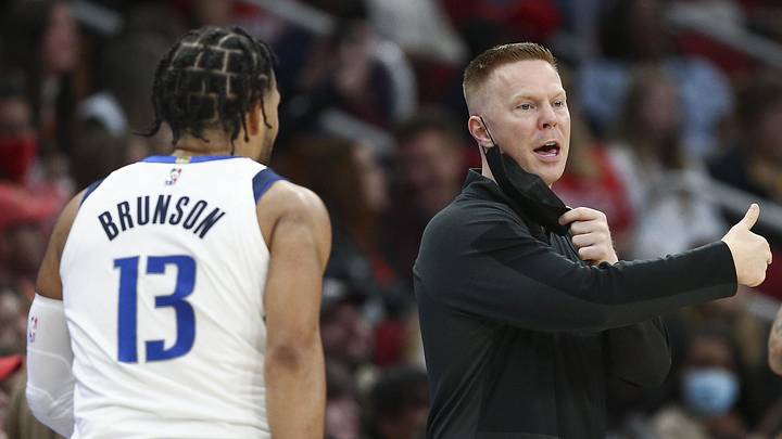 Jan 7, 2022; Houston, Texas, USA; Dallas Mavericks acting head coach Sean Sweeney reacts during the second quarter against the Houston Rockets at Toyota Center. Mandatory Credit: Troy Taormina-Imagn Images