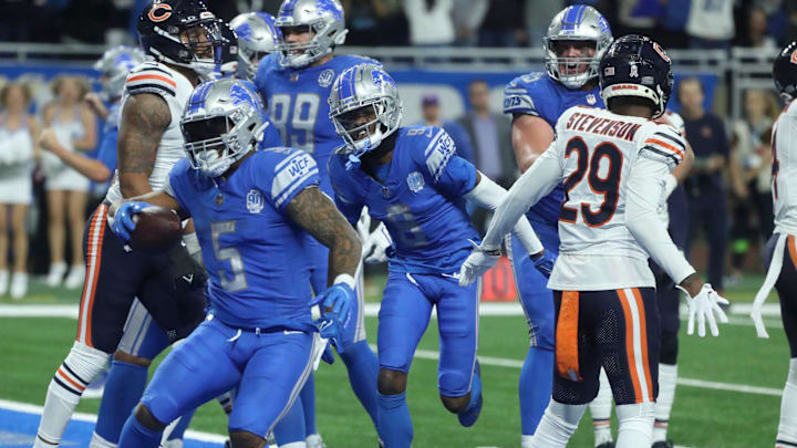 David Montgomery celebrates scoring a fourth-quarter touchdown in the Lions' comeback win last year at Ford Field.