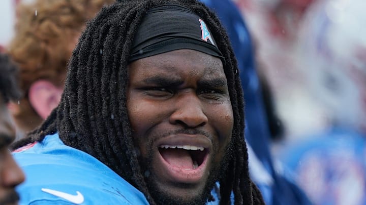 Tennessee Titans defensive tackle T'Vondre Sweat talks to teammates on the sidelines as they play the Houston Texans.
