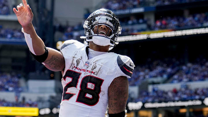 Houston Texans running back Joe Mixon (28) celebrates after scoring a touchdown Sunday, Sept. 8, 2024, during a game against the Indianapolis Colts at Lucas Oil Stadium in Indianapolis.