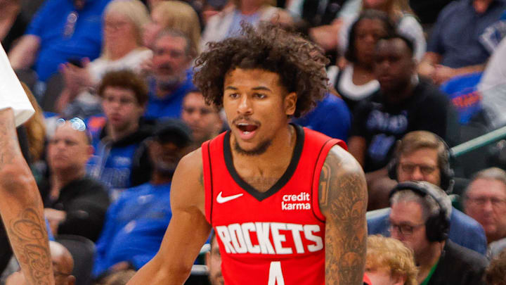 Apr 7, 2024; Dallas, Texas, USA; Houston Rockets guard Jalen Green (4) is guarded by Dallas Mavericks forward Derrick Jones Jr. (55) during the third quarter at American Airlines Center. Mandatory Credit: Andrew Dieb-Imagn Images