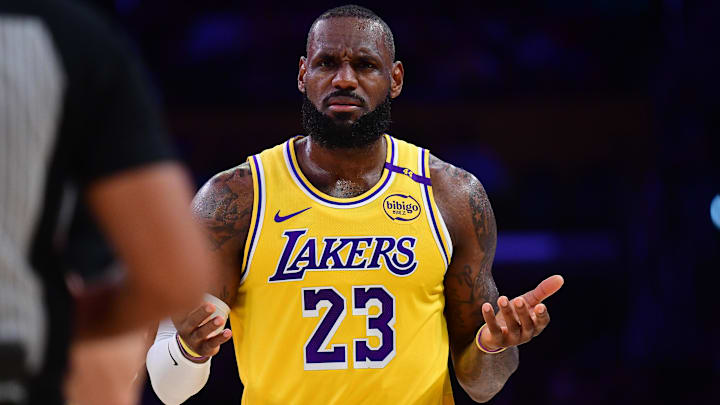 Dec 31, 2024; Los Angeles, California, USA; Los Angeles Lakers forward LeBron James (23) reacts during the first half at Crypto.com Arena. Mandatory Credit: Gary A. Vasquez-Imagn Images