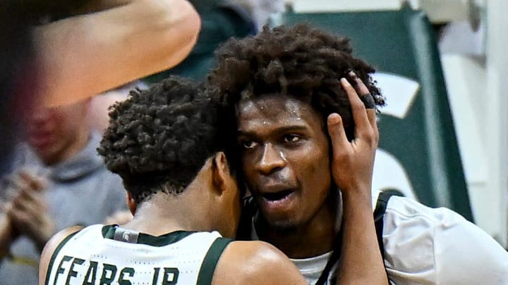 Michigan State's Jeremy Fears Jr., left, hugs Coen Carr after the Spartans win over Illinois in overtime on Saturday, Feb. 7, 2026, at the Breslin Center in East Lansing.