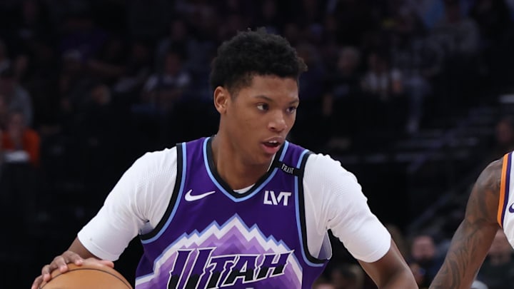 Oct 27, 2025; Salt Lake City, Utah, USA; Utah Jazz guard Ace Bailey (19) drives against Phoenix Suns forward Royce O'Neale (00) during the second half at Delta Center. Mandatory Credit: Rob Gray-Imagn Images