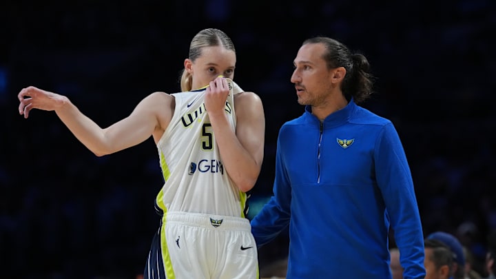Aug 20, 2025; Los Angeles, California, USA; Dallas Wings coach Chris Koclanes talks with guard Paige Bueckers (5) against the LA Sparks in the first half at Crypto.com Arena. Mandatory Credit: Kirby Lee-Imagn Images Aug 20, 2025; Los Angeles, California, USA; Dallas Wings coach Chris Koclanes talks with guard Paige Bueckers (5) against the LA Sparks in the first half at Crypto.com Arena. Mandatory Credit: Kirby Lee-Imagn Images