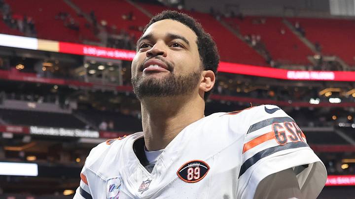 Chicago Bears quarterback Caleb Williams (18) walks off the field Chicago Bears quarterback Caleb Williams (18) walks off the field