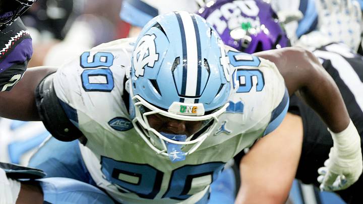 Aug 29, 2026; Dublin, Co. Dublin, IRL;  TCU Horned Frogs running back Jeremy Payne (26) breaks the tackle of North Carolina Tar Heels defensive back Kaleb Cost (2) in the second half at Aviva Stadium.  Mandatory Credit: Laszlo Geczo-Imagn Images