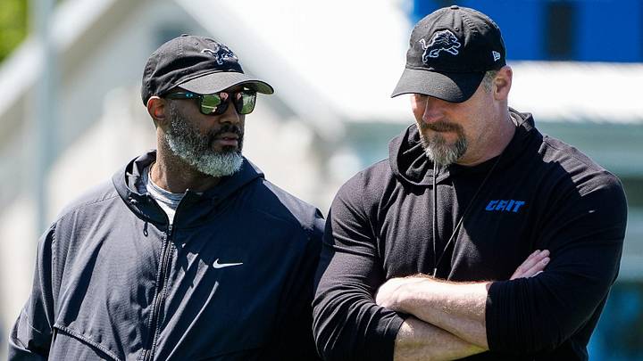 Detroit Lions general manager Brad Holmes, left, talks to coach Dan Campbell as they walk off the field after practice during rookie minicamp at the Lions' Meijer Performance Center in Allen Park on Friday, May 9, 2025.
