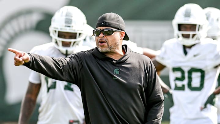 Michigan State's cornerbacks coach Demetrice Martin works with players during the first day of football camp on Tuesday, July 30, 2024, in East Lansing.