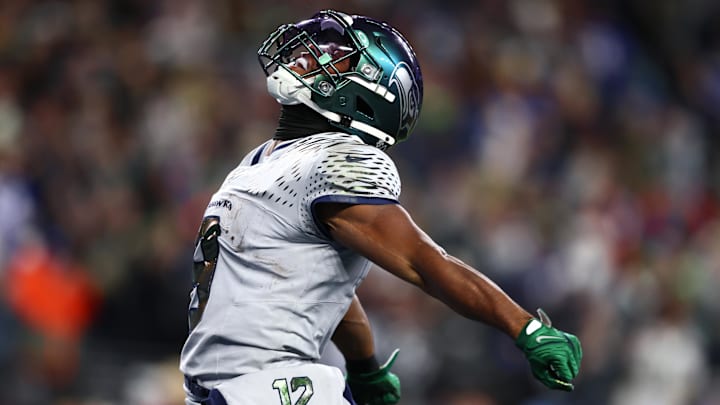 Dec 18, 2025; Seattle, Washington, USA; Seattle Seahawks running back Kenneth Walker III (9) reacts after a first down against the Los Angeles Rams in the first half at Lumen Field. Mandatory Credit: Kevin Ng-Imagn Images