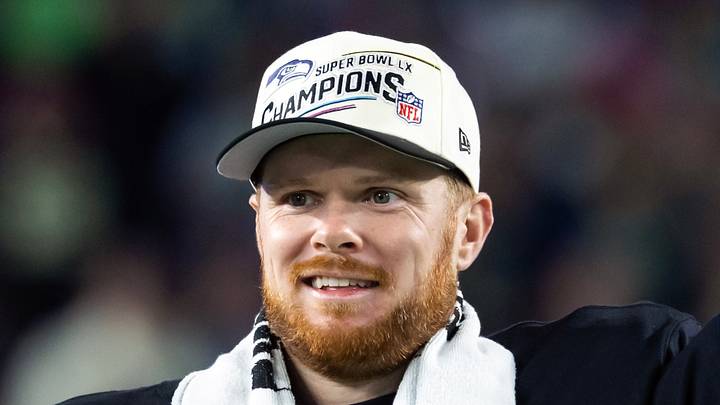 Seattle Seahawks quarterback Sam Darnold celebrates with the Vince Lombardi Trophy 
