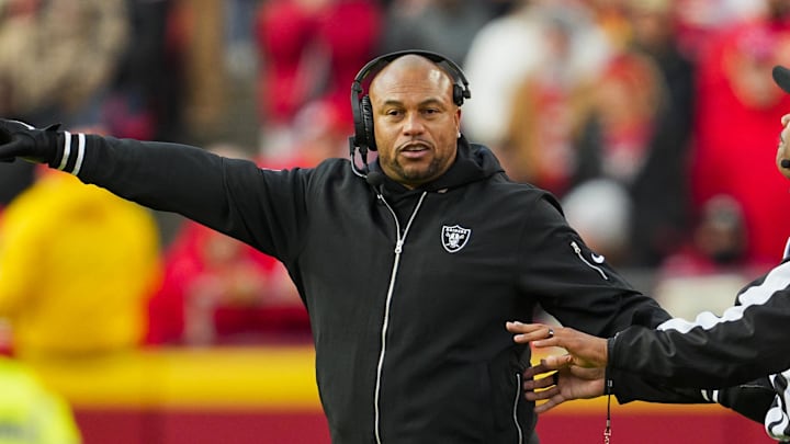 Nov 29, 2024; Kansas City, Missouri, USA; Las Vegas Raiders head coach Antonio Pierce reacts during the first half against the Kansas City Chiefs at GEHA Field at Arrowhead Stadium. Mandatory Credit: Jay Biggerstaff-Imagn Images