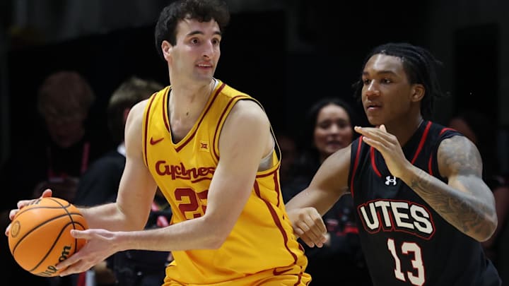 Feb 24, 2026; Salt Lake City, Utah, USA; Iowa State Cyclones forward Milan Momcilovic (22) posts up against Utah Utes forward Kendyl Sanders (13) during the second half at Jon M. Huntsman Center. Feb 24, 2026; Salt Lake City, Utah, USA; Iowa State Cyclones forward Milan Momcilovic (22) posts up against Utah Utes forward Kendyl Sanders (13) during the second half at Jon M. Huntsman Center.
