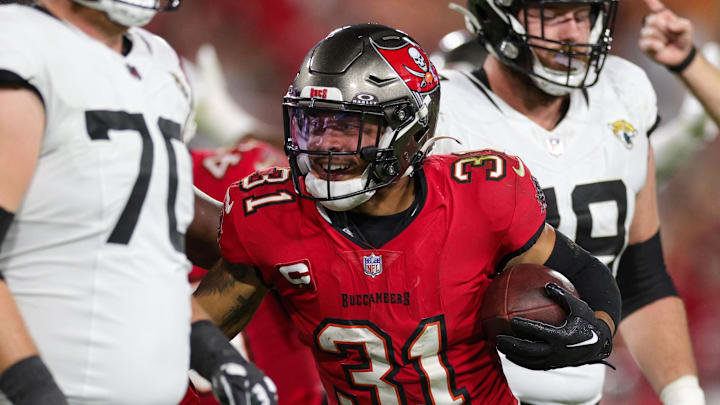 Dec 24, 2023; Tampa, Florida, USA;  Tampa Bay Buccaneers safety Antoine Winfield Jr. (31) reacts after recovering a fumble against the Jacksonville Jaguars in the fourth quarter at Raymond James Stadium. Mandatory Credit: Nathan Ray Seebeck-Imagn Images