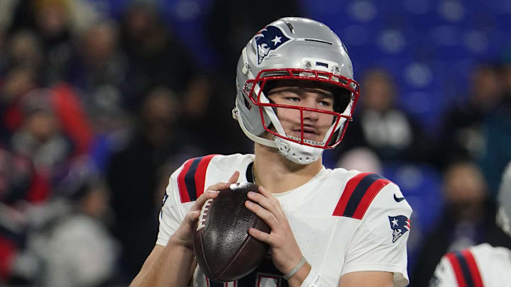 Dec 21, 2025; Baltimore, Maryland, USA;  New England Patriots quarterback Drake Maye (10) warms up prior to the game against the Baltimore Ravens at M&T Bank Stadium. Mandatory Credit: James Lang-Imagn Images