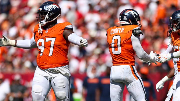 Sep 22, 2024; Tampa, Florida, USA; Denver Broncos linebacker Jonathon Cooper (0) celebrates after a sack against the Tampa Bay Buccaneers in the fourth quarter at Raymond James Stadium. 