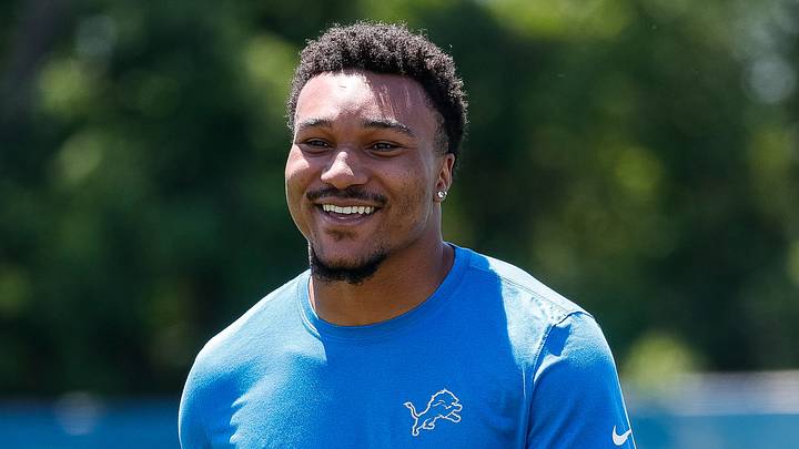 Detroit Lions safety Brian Branch (32) smiles