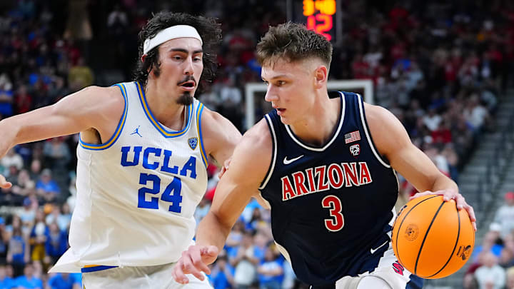 Mar 11, 2023; Las Vegas, NV, USA; Arizona Wildcats guard Pelle Larsson (3) dribbles against UCLA Bruins guard Jaime Jaquez Jr. (24) during the second half at T-Mobile Arena. Mandatory Credit: Stephen R. Sylvanie-Imagn Images Mar 11, 2023; Las Vegas, NV, USA; Arizona Wildcats guard Pelle Larsson (3) dribbles against UCLA Bruins guard Jaime Jaquez Jr. (24) during the second half at T-Mobile Arena. Mandatory Credit: Stephen R. Sylvanie-Imagn Images