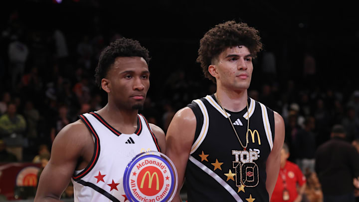 Apr 1, 2025; Brooklyn, NY, USA; McDonald's All American West guard Darryn Peterson (22) and McDonald's All American East forward Cameron Boozer (12) pose for photos after the game at Barclays Center. Mandatory Credit: Pamela Smith-Imagn Images