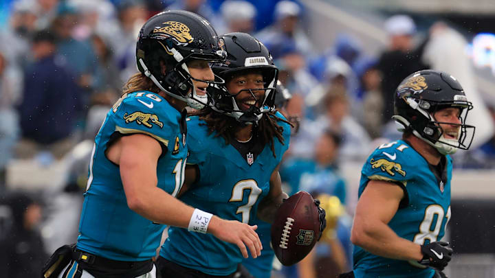 Jacksonville Jaguars wide receiver Jakobi Meyers (3) celebrates his touchdown with quarterback Trevor Lawrence (16) and wide receiver Austin Trammell (81) during the first quarter of an NFL football game at EverBank Stadium, Sunday, Dec. 7, 2025, in Jacksonville, Fla. [Corey Perrine/Florida Times-Union]