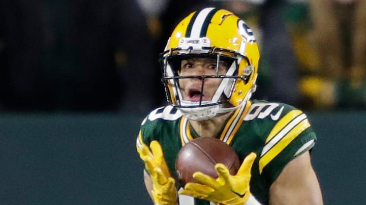 Green Bay Packers wide receiver Christian Watson (9) pulls down a touchdown reception against Dallas Cowboys in 2022. Green Bay Packers wide receiver Christian Watson (9) pulls down a touchdown reception against Dallas Cowboys in 2022.