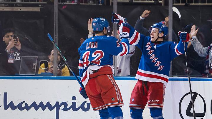 Apr 5, 2026; New York, New York, USA; New York Rangers left wing Adam Sykora (38) celebrates his goal with center Noah Laba (42) during the second period against the Washington Capitals at Madison Square Garden. 