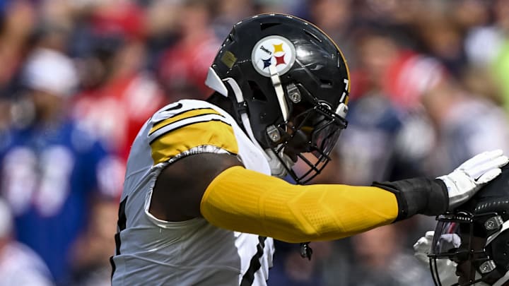 Sep 21, 2025; Foxborough, Massachusetts, USA; Pittsburgh Steelers running back Kenneth Gainwell (14) and Pittsburgh Steelers offensive tackle Broderick Jones (77) react after a touchdown during the first quarter at Gillette Stadium. Mandatory Credit: Brian Fluharty-Imagn Images
