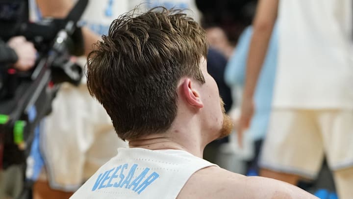 Mar 19, 2026; Greenville, SC, USA; North Carolina Tar Heels center Henri Veesaar (13) reacts after losing to the VCU Rams in overtime of a first round game of the men's 2026 NCAA Tournament at Bon Secours Wellness Arena. Mandatory Credit: Bob Donnan-Imagn Images Mar 19, 2026; Greenville, SC, USA; North Carolina Tar Heels center Henri Veesaar (13) reacts after losing to the VCU Rams in overtime of a first round game of the men's 2026 NCAA Tournament at Bon Secours Wellness Arena. Mandatory Credit: Bob Donnan-Imagn Images