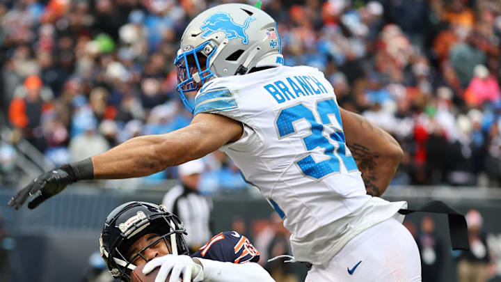 Former Chicago Bears wide receiver Keenan Allen (13) makes a catch Detroit Lions safety Brian Branch (32) 
