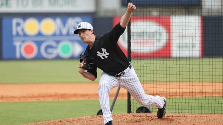 Feb 20, 2025; Tampa, FL, USA; New York Yankees pitcher Max Fried (54) throws the ball during work outs at George M. Steinbrenner Field. 