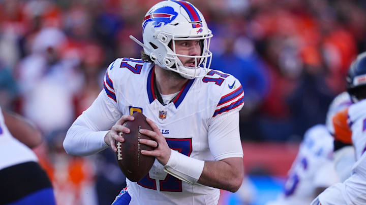 Buffalo Bills quarterback Josh Allen rolls out during the AFC Divisional Round playoff game against the Denver Broncos. Buffalo Bills quarterback Josh Allen rolls out during the AFC Divisional Round playoff game against the Denver Broncos.