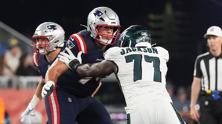 Aug 22, 2026; Foxborough, Massachusetts, USA;  New England Patriots offensive tackle Caleb Lomu (74) blocks Philadelphia Eagles linebacker Tarron Jackson (77) during the second half at Gillette Stadium.  Mandatory Credit: Gregory Fisher-Imagn Images