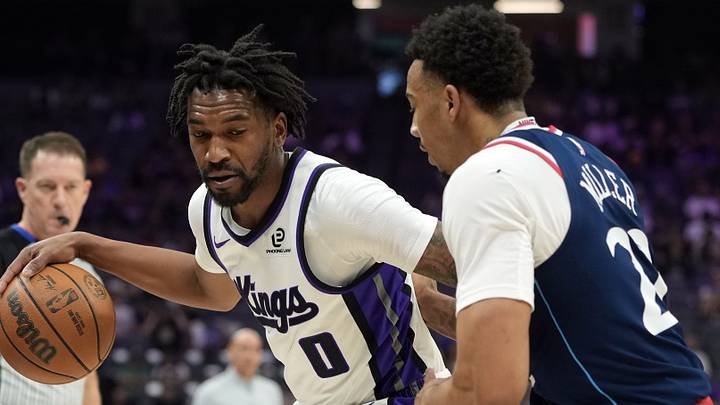 Apr 5, 2026; Sacramento, California, USA; Sacramento Kings guard Malik Monk (0) dribbles against LA Clippers guard Jordan Miller (right) during the second quarter at Golden 1 Center. Mandatory Credit: Darren Yamashita-Imagn Images Apr 5, 2026; Sacramento, California, USA; Sacramento Kings guard Malik Monk (0) dribbles against LA Clippers guard Jordan Miller (right) during the second quarter at Golden 1 Center. Mandatory Credit: Darren Yamashita-Imagn Images