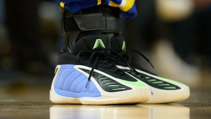 Golden State Warriors guard Stephen Curry wears the adidas Anthony Edwards 2 "Blue Fusion" colorway.