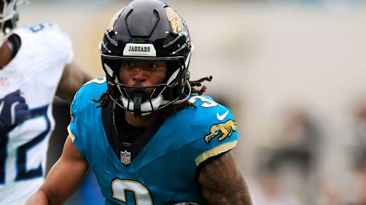 Jacksonville Jaguars wide receiver Jakobi Meyers (3) rushes for yards during the fourth quarter of an NFL football matchup at EverBank Stadium, Sunday, Jan. 4, 2026, in Jacksonville, Fla. The Jaguars defeated the Titans 41-7, capturing the AFC South title. [Corey Perrine/Florida Times-Union]