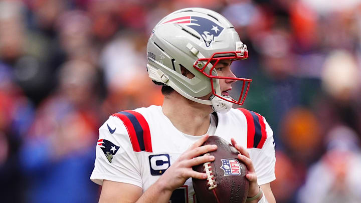 Jan 25, 2026; Denver, CO, USA; New England Patriots quarterback Drake Maye (10) drops back to pass against the Denver Broncos during the first half in the 2026 AFC Championship Game at Empower Field at Mile High. Mandatory Credit: Ron Chenoy-Imagn Images