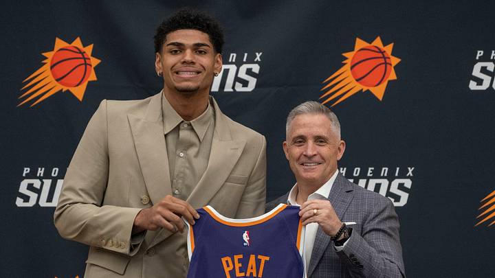 Koa Peat (left) with Suns GM Brian Gregory during an introductory news conference at the Verizon 5G Performance Center in Phoenix on June 26, 2026. Koa Peat (left) with Suns GM Brian Gregory during an introductory news conference at the Verizon 5G Performance Center in Phoenix on June 26, 2026.