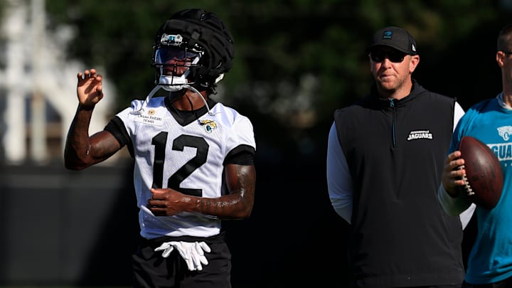 Jacksonville Jaguars wide receiver Travis Hunter (12) stands next to Jacksonville Jaguars head coach Liam Coen during an NFL training camp session at the Miller Electric Center, Monday, Aug. 11, 2025 in Jacksonville, Fla. [Corey Perrine/Florida Times-Union]