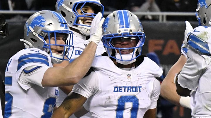 Detroit Lions running back Jahmyr Gibbs (0) celebrates with teammates after scoring a touchdown against Bears