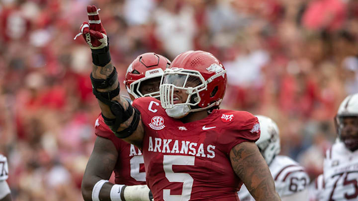 Arkansas' Cam Ball celebrates after a play against Alabama A&M during the Razorbacks' season opener inside Razorback Stadium. The Razorbacks won 52-7. 
