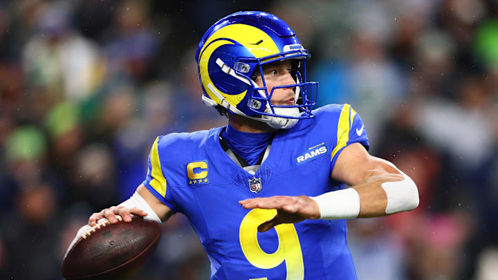 Dec 18, 2025; Seattle, Washington, USA; Los Angeles Rams quarterback Matthew Stafford (9) passes against the Seattle Seahawks in the first half at Lumen Field. Mandatory Credit: Kevin Ng-Imagn Images