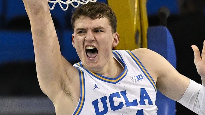 Nov 22, 2024; Los Angeles, California, USA; UCLA Bruins forward Tyler Bilodeau (34) lets out a yell after throwing down a slam dunk during the first half against the Cal State Fullerton Titans at Pauley Pavilion presented by Wescom. Mandatory Credit: Robert Hanashiro-Imagn Images