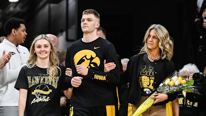 Mar 5, 2026; Iowa City, Iowa, USA; Iowa Hawkeyes guard Bennett Stirtz (14) is recognized at senior day before the game against the Michigan Wolverines at Carver-Hawkeye Arena. Mandatory Credit: Jeffrey Becker-Imagn Images