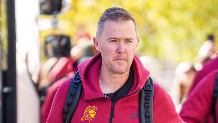 Nov 1, 2025; Lincoln, Nebraska, USA; Southern California Trojans head coach Lincoln Riley arrives at the stadium before the game against the Nebraska Cornhuskers at Memorial Stadium. Mandatory Credit: Dylan Widger-Imagn Images Nov 1, 2025; Lincoln, Nebraska, USA; Southern California Trojans head coach Lincoln Riley arrives at the stadium before the game against the Nebraska Cornhuskers at Memorial Stadium. Mandatory Credit: Dylan Widger-Imagn Images