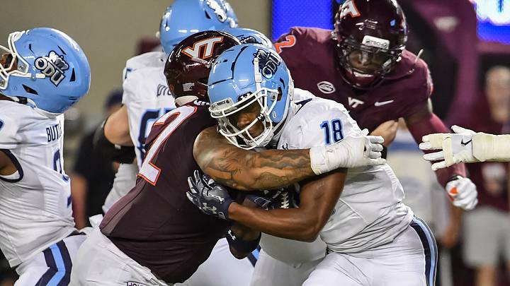 Sept. 13, 2025; Blacksburg, Va.; Virginia Tech defensive lineman Kelvin Gilliam Jr. (22) tackles Old Dominion running back Ke'Travion Hargrove (18). Sept. 13, 2025; Blacksburg, Va.; Virginia Tech defensive lineman Kelvin Gilliam Jr. (22) tackles Old Dominion running back Ke'Travion Hargrove (18).