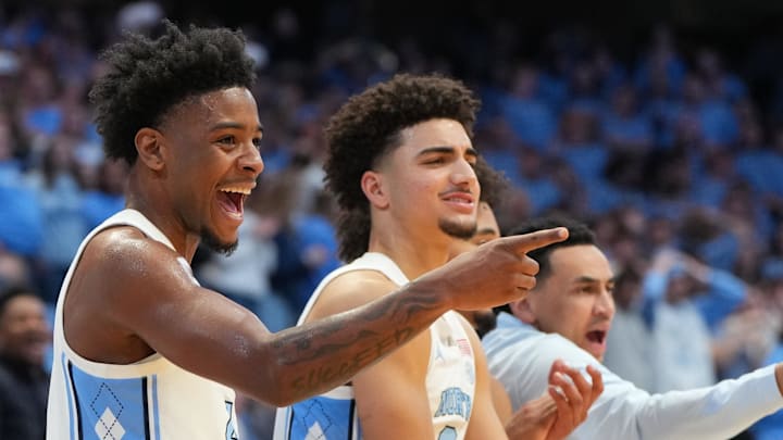 Jan 21, 2026; Chapel Hill, North Carolina, USA; North Carolina Tar Heels guard Jaydon Young (4) and guard Derek Dixon (3) react in the second half at Dean E. Smith Center. Mandatory Credit: Bob Donnan-Imagn Images