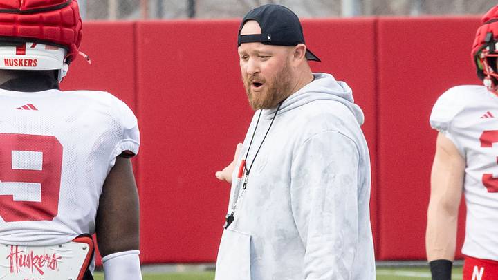 Rob Aurich instructs linebacker Vincent Shavers during a spring practice. Rob Aurich instructs linebacker Vincent Shavers during a spring practice.