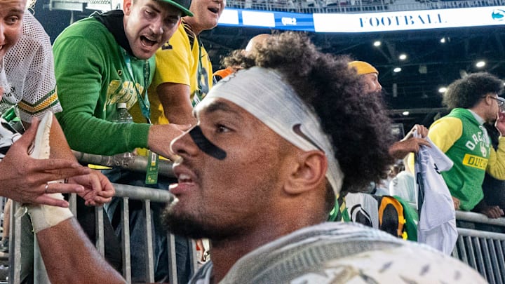 Oregon tight end Kenyon Sadiq celebrates with fans as the Oregon Ducks face the Penn State Nittany Lions on Sept. 27, 2025, at Beaver Stadium in University Park, Pennsylvania.