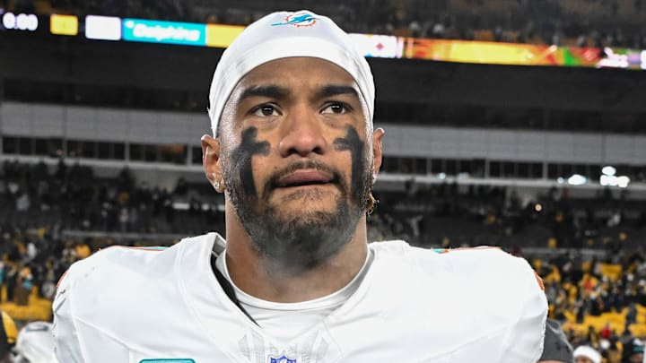 Dec 15, 2025; Pittsburgh, Pennsylvania, USA; Miami Dolphins quarterback Tua Tagovailoa (1) leaves the  field following a game against the Pittsburgh Steelers at Acrisure Stadium. Mandatory Credit: Barry Reeger-Imagn Images